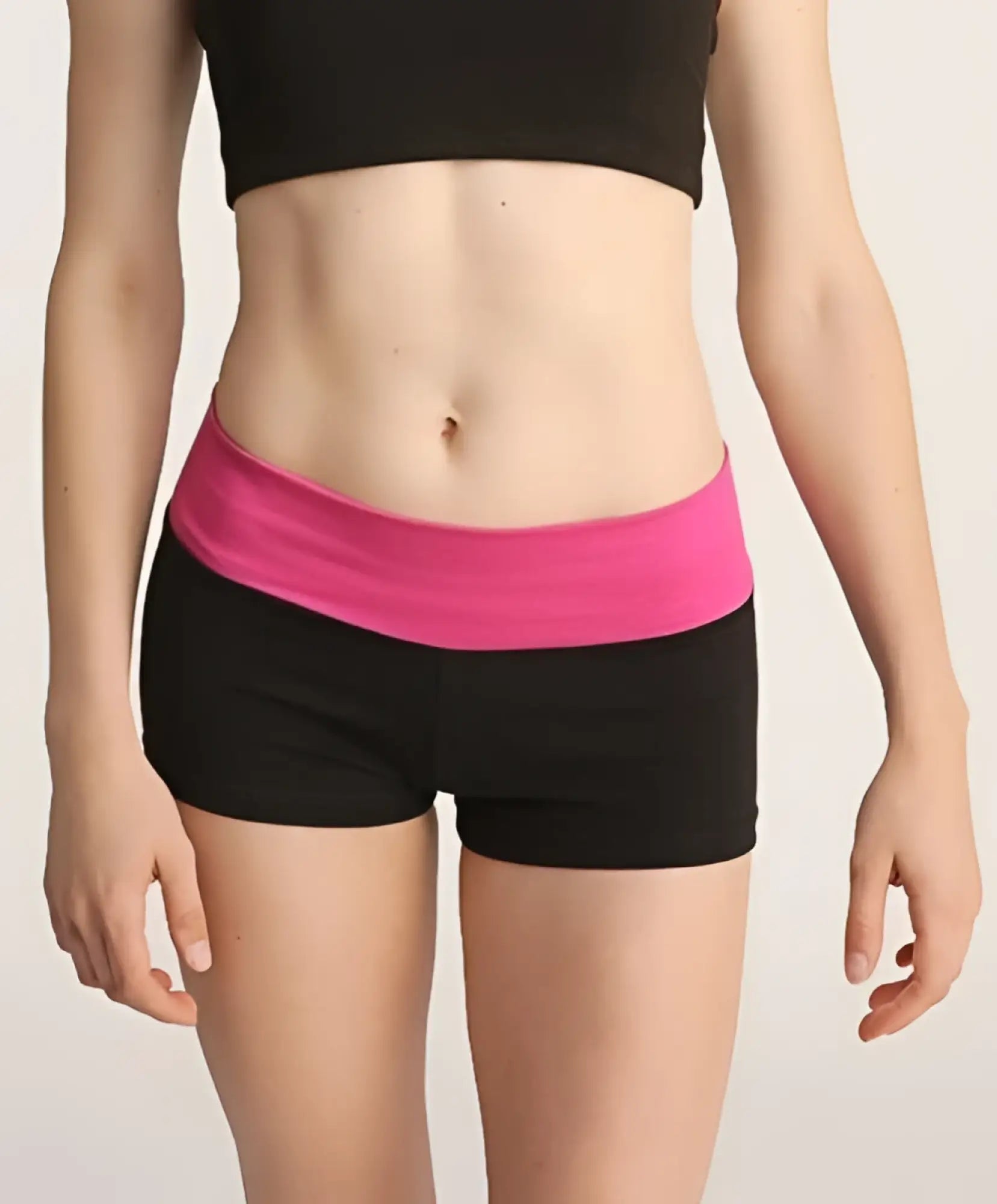 Black bumble short athletic shorts with a vibrant pink elastic waistband designed for active wear