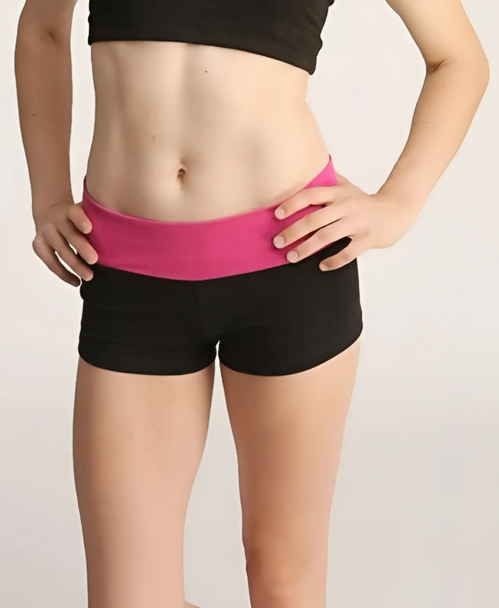 Black athletic shorts with a vibrant pink elastic waistband designed for comfort and active wear bumble short