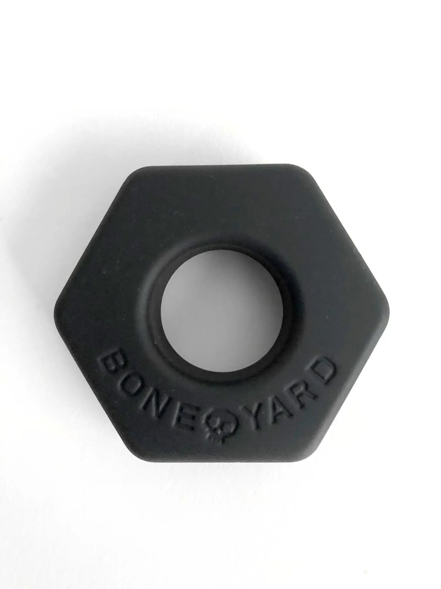 Black hexagonal silicone ring bust a nut with bone yard embossed around the center for durable everyday wear