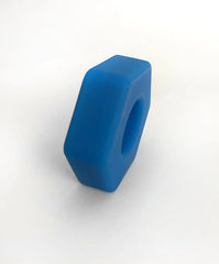 Blue silicone hexagonal nut from bust a nut featuring durable flexible material for secure fastening applications