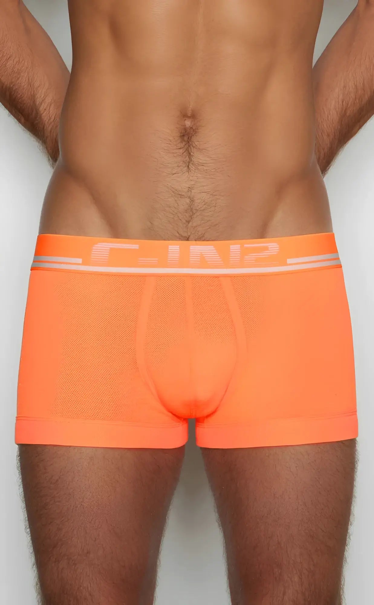 Bright orange c-in2 trunk 1023 men’s briefs with mesh texture and white logo trim