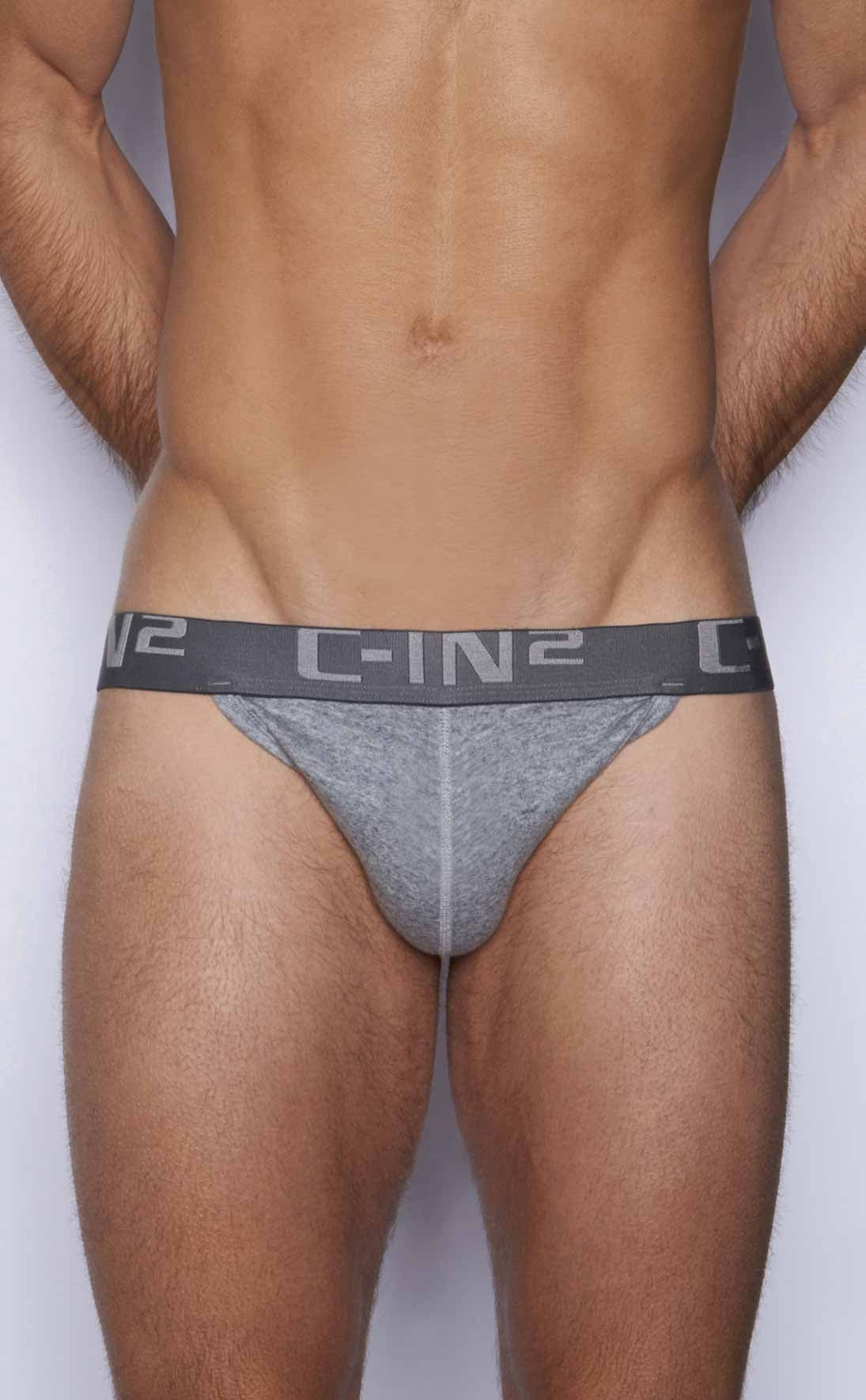 Gray c-in2 y-back thong briefs with textured fabric and elastic waistband showing the back side of the product