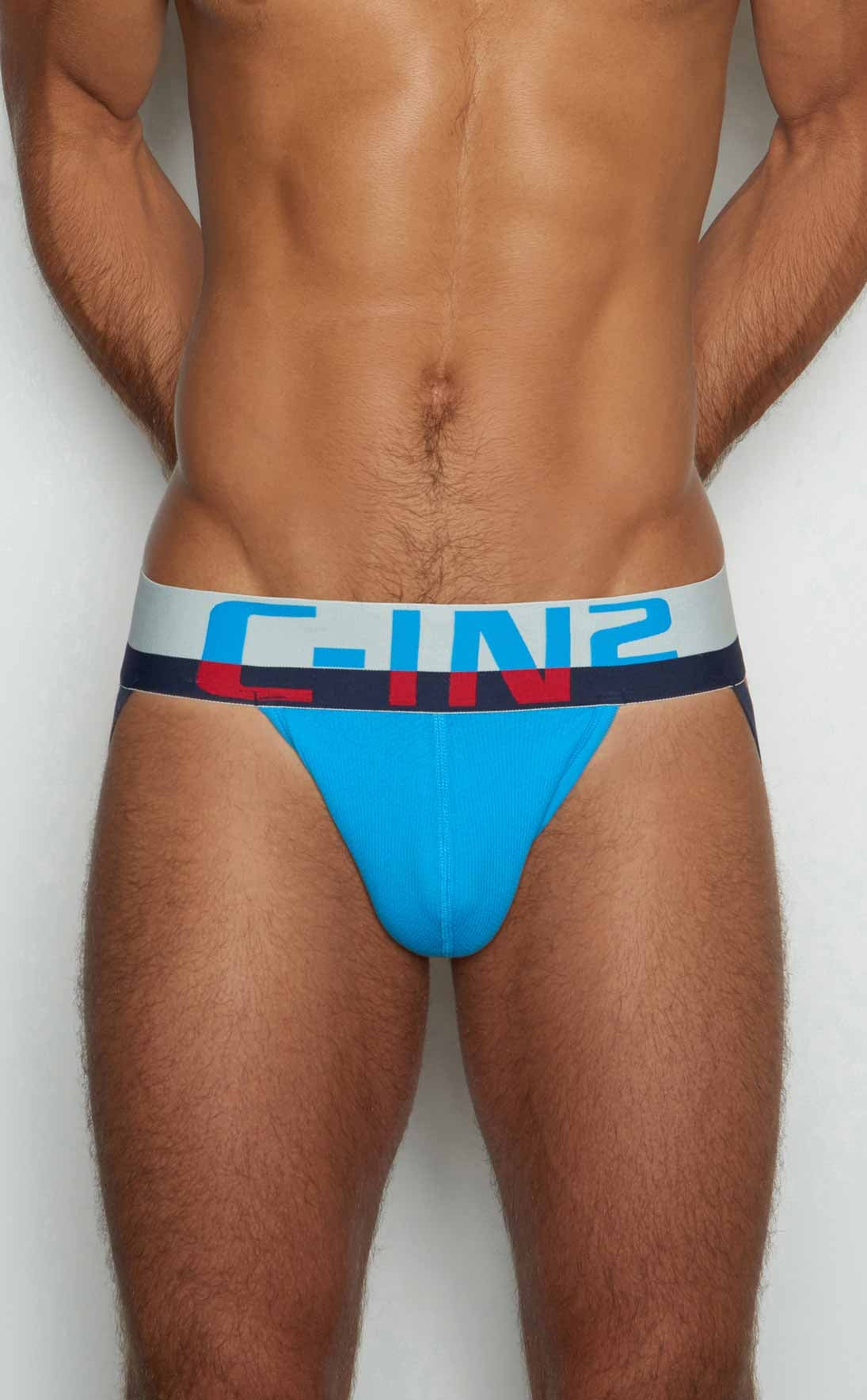 Bright blue c-in2 jockstrap 8025-412 with white and navy waistband featuring bold red lettering front view