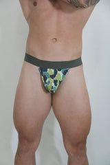 Green and black camouflage thong with solid dark green waistband designed for comfortable everyday wear
