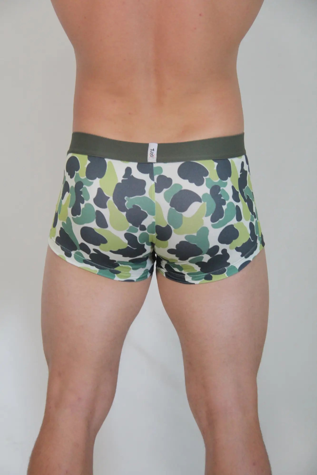 Men’s camouflage trunk briefs with green and black pattern and olive green waistband for everyday wear