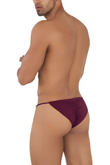 A sleek deep burgundy candy man 99710 holes in one bikini thong made of smooth fabric with a minimalist design