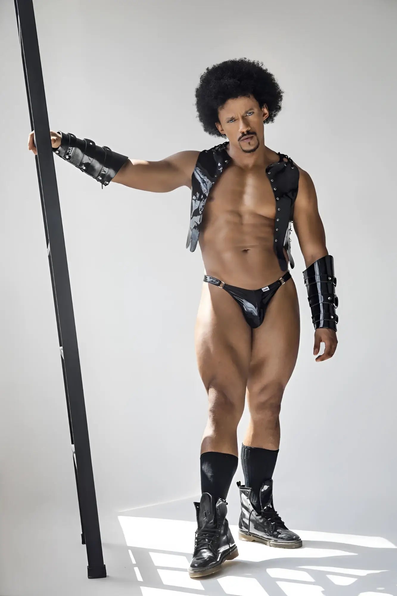 Black leather vest with silver studs and matching armored arm guards in gloss black CandyMan 99819 Dom Thongs
