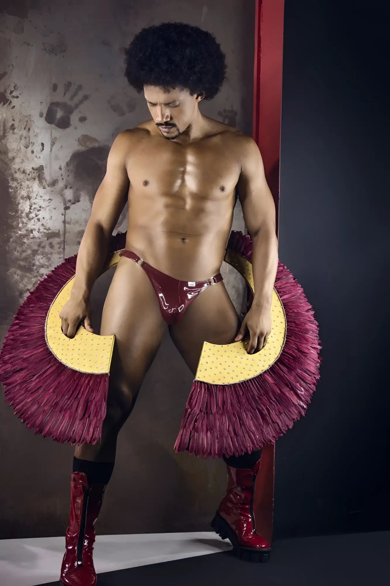 CandyMan 99819 dom thongs color gloss wine shiny maroon latex thong with bold fringed magenta and yellow circular accessories
