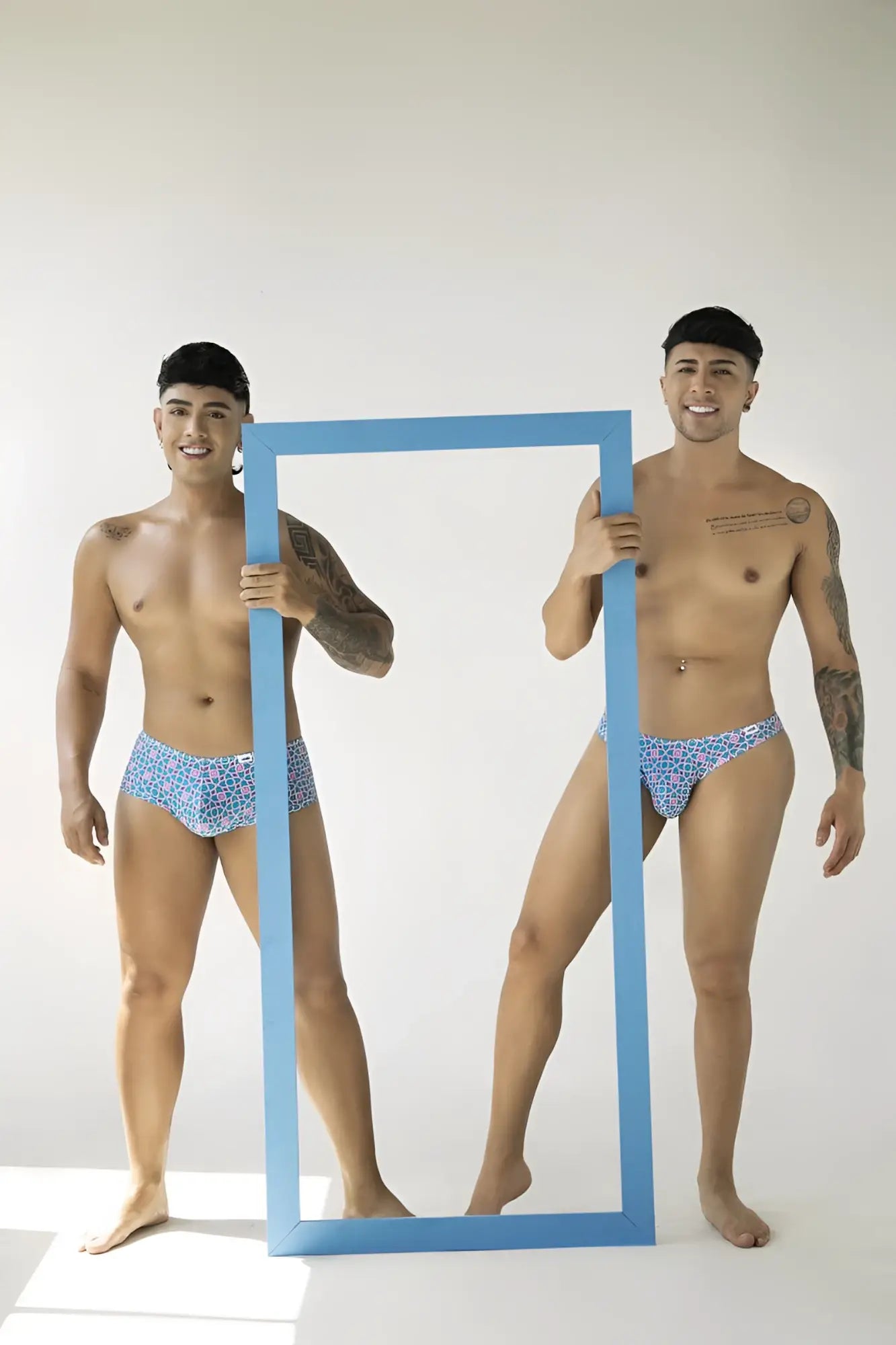Blue patterned CandyMan 99924 swim trunks featuring printed thongs design for stylish beachwear