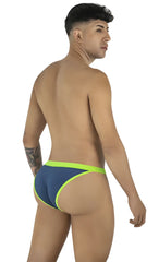 CandyMan navy bikini with neon green trim, viewed from the side on a shirtless male model.