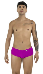 CandyMan magenta trunks, form-fitting low-rise style on a man facing forward, isolated on a white background.