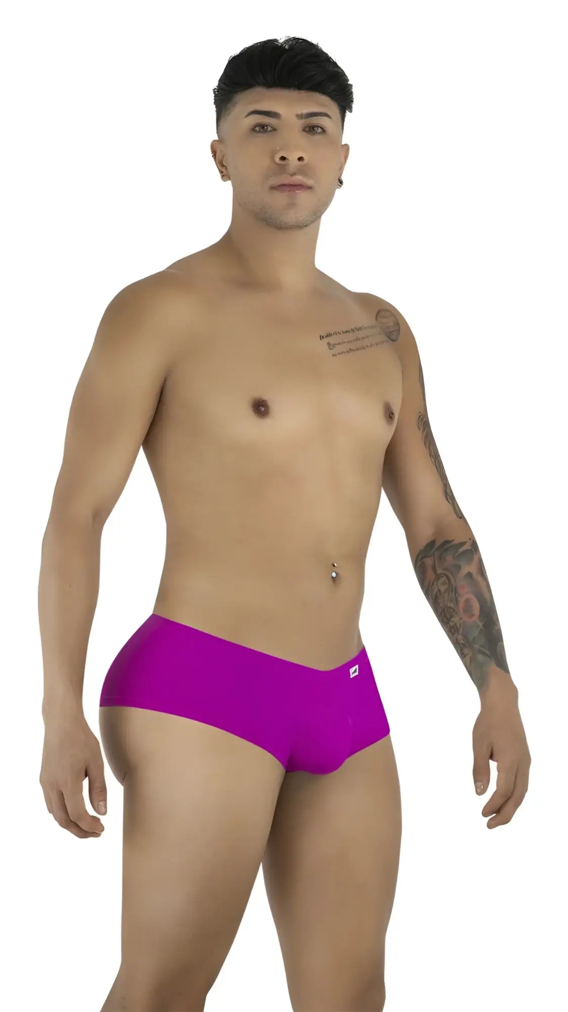 CandyMan magenta trunks, fitted style, worn by a standing man with tattoos, against a white background.