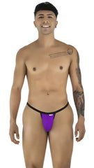 Model wearing CandyMan orchid thong with thin black waistband, standing and smiling against a white background.