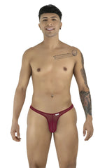 Model posing in CandyMan burgundy mesh thongs, featuring a minimal, slim-fit design with a small brand logo tag.
