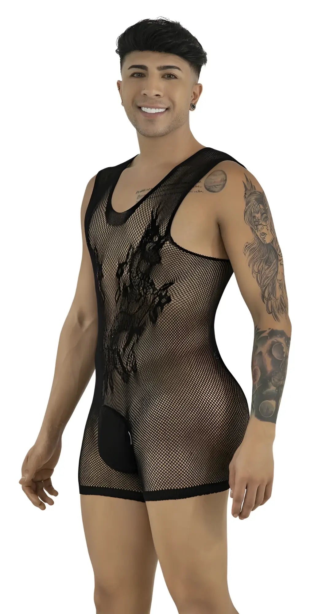 CandyMan black sleeveless fishnet bodysuit with lace detailing and pouch, worn by a smiling tattooed male model.