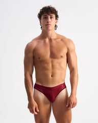 A maroon ribbed lace-trimmed brief with sleek modern design from casanova brief collection