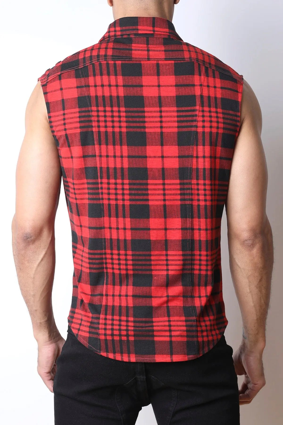 Back view of a man wearing a red and black plaid sleeveless shirt made of soft fabric by CellBlock 13