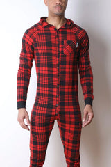 Man wearing red and black plaid hooded union suit with front snap buttons and chest pocket by CellBlock 13