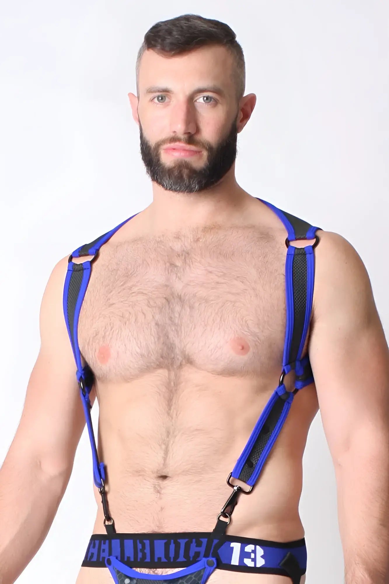 Blue and black leather harness with adjustable straps and metal clasps from cellblock 13 cyber x-treme size l