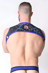 Blue and black mesh cyber x-treme harness with geometric pattern and cell block 13 logo on the back in size l