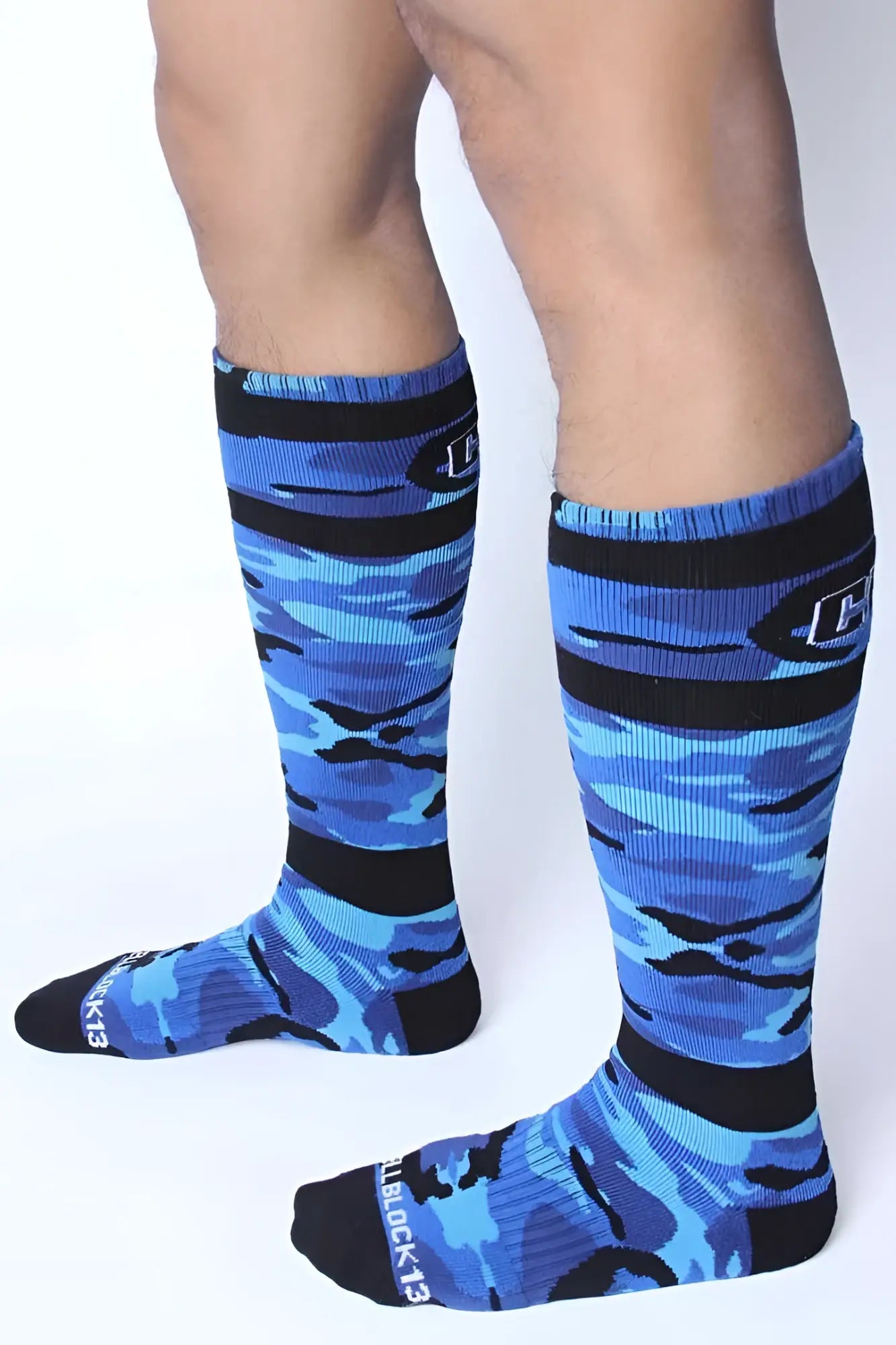 Blue and black camouflage knee-high cellblock 13 foxhole socks with ribbed texture and reinforced toe and heel areas