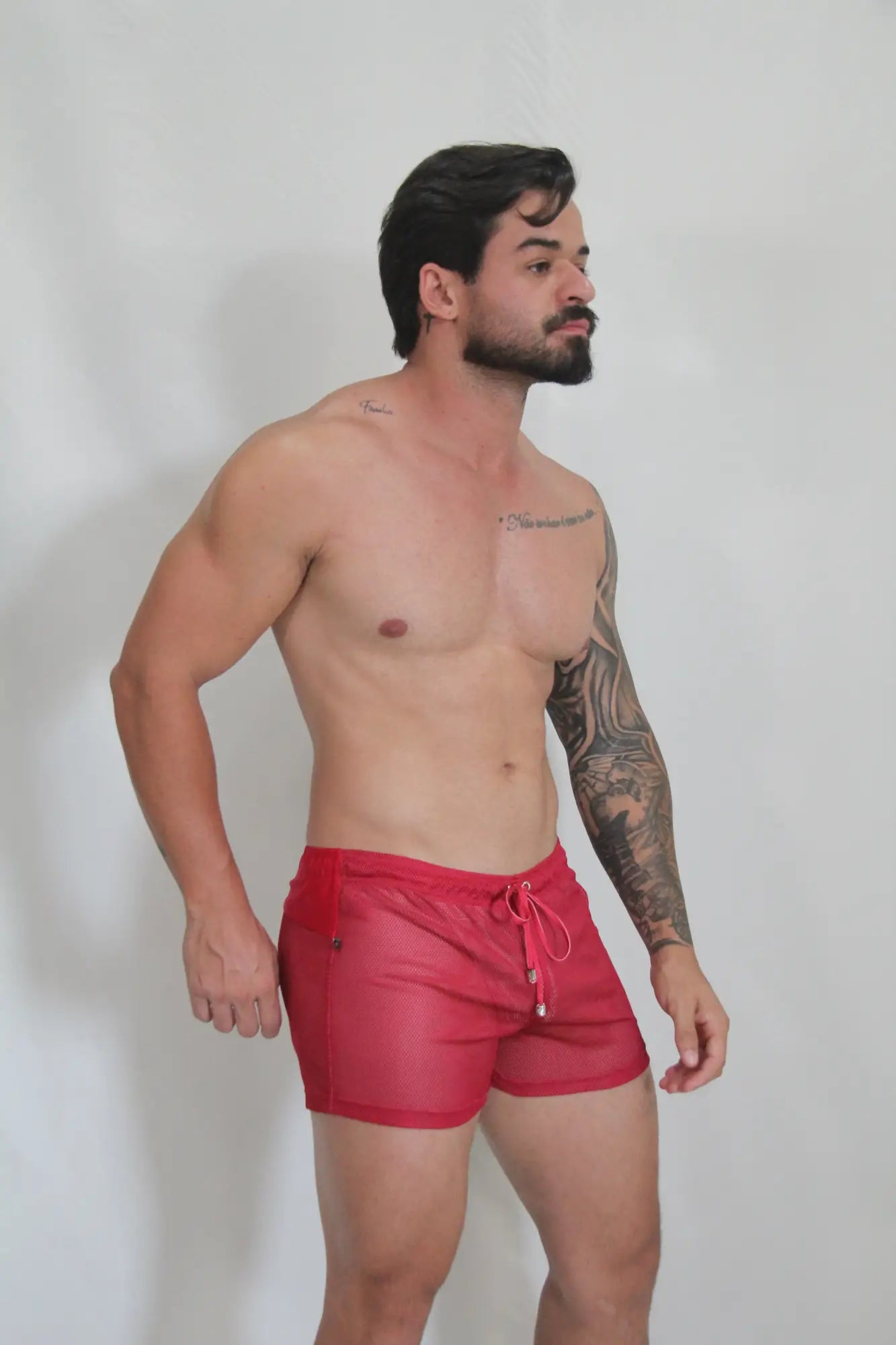 Red mesh circuit mesh short swim trunks with white drawstring ties available in 4 colors