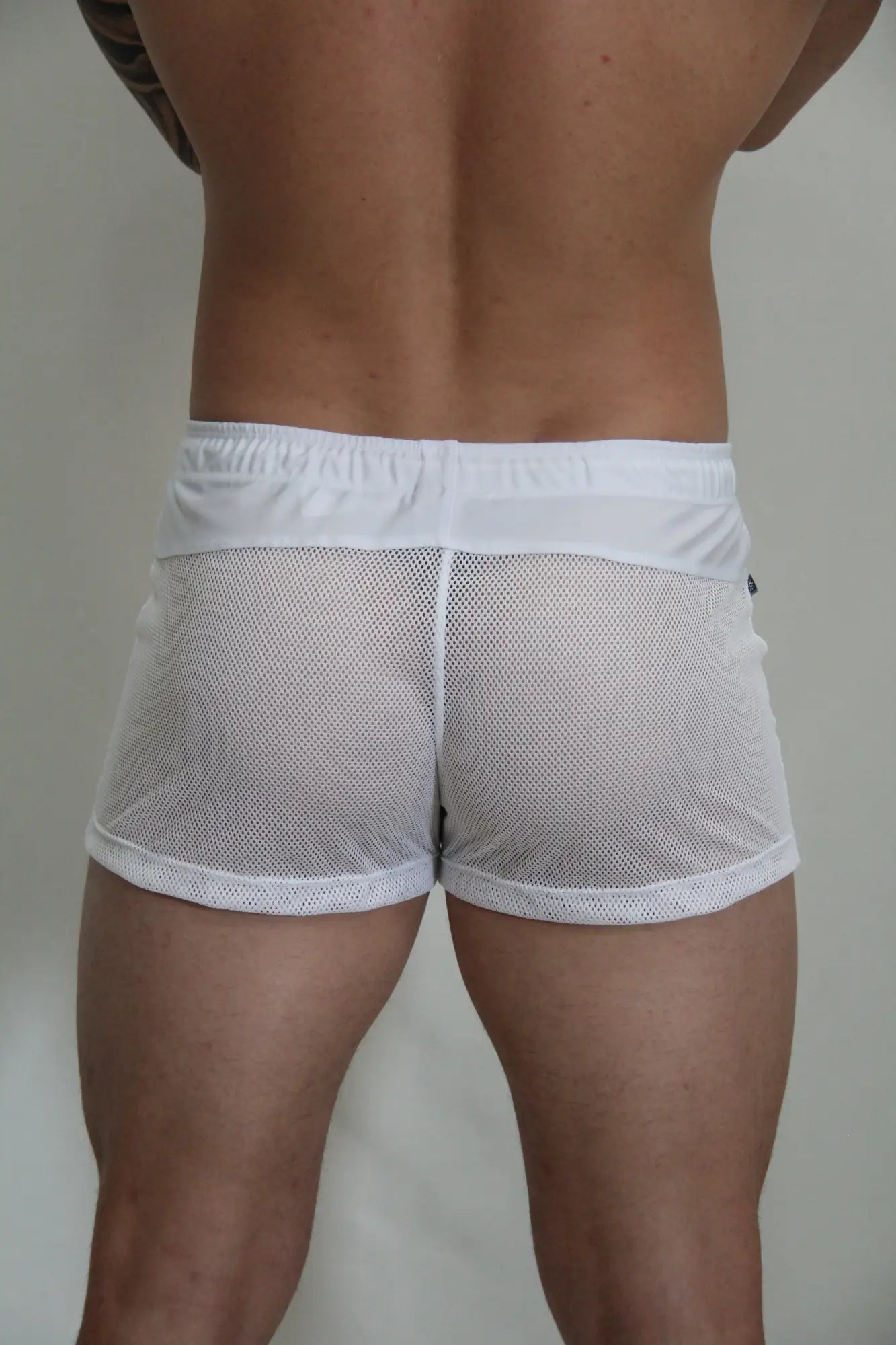 White mesh athletic shorts circuit mesh short with solid white elastic waistband for active wear