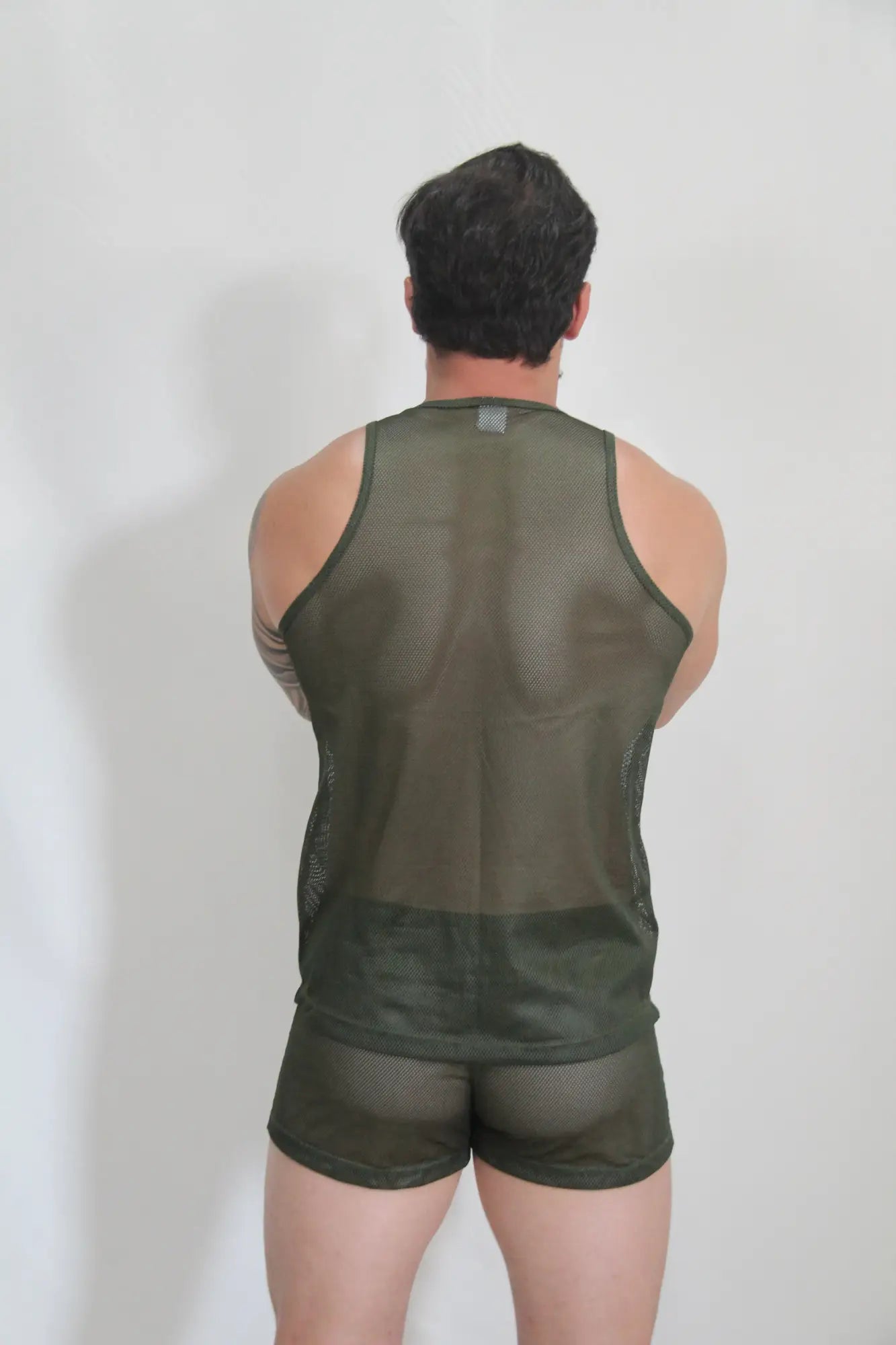 Olive green circuit mesh tank with breathable mesh fabric and solid bottom hem for active wear in four colors available