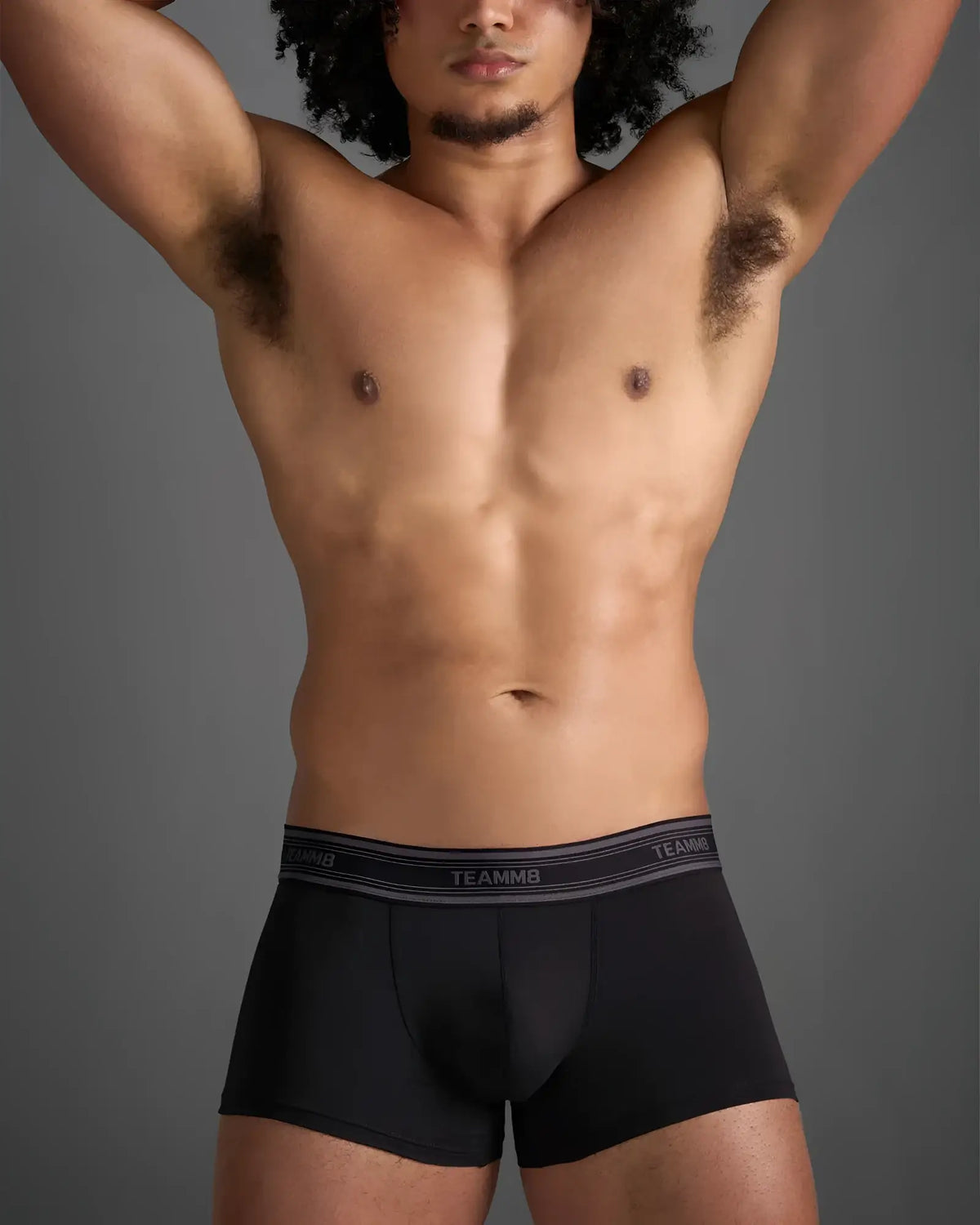 Classic cotton trunk black boxer briefs with gray elastic waistband featuring white brand name lettering
