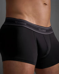 Black classic cotton trunk men’s briefs with gray elastic waistband featuring white branded lettering