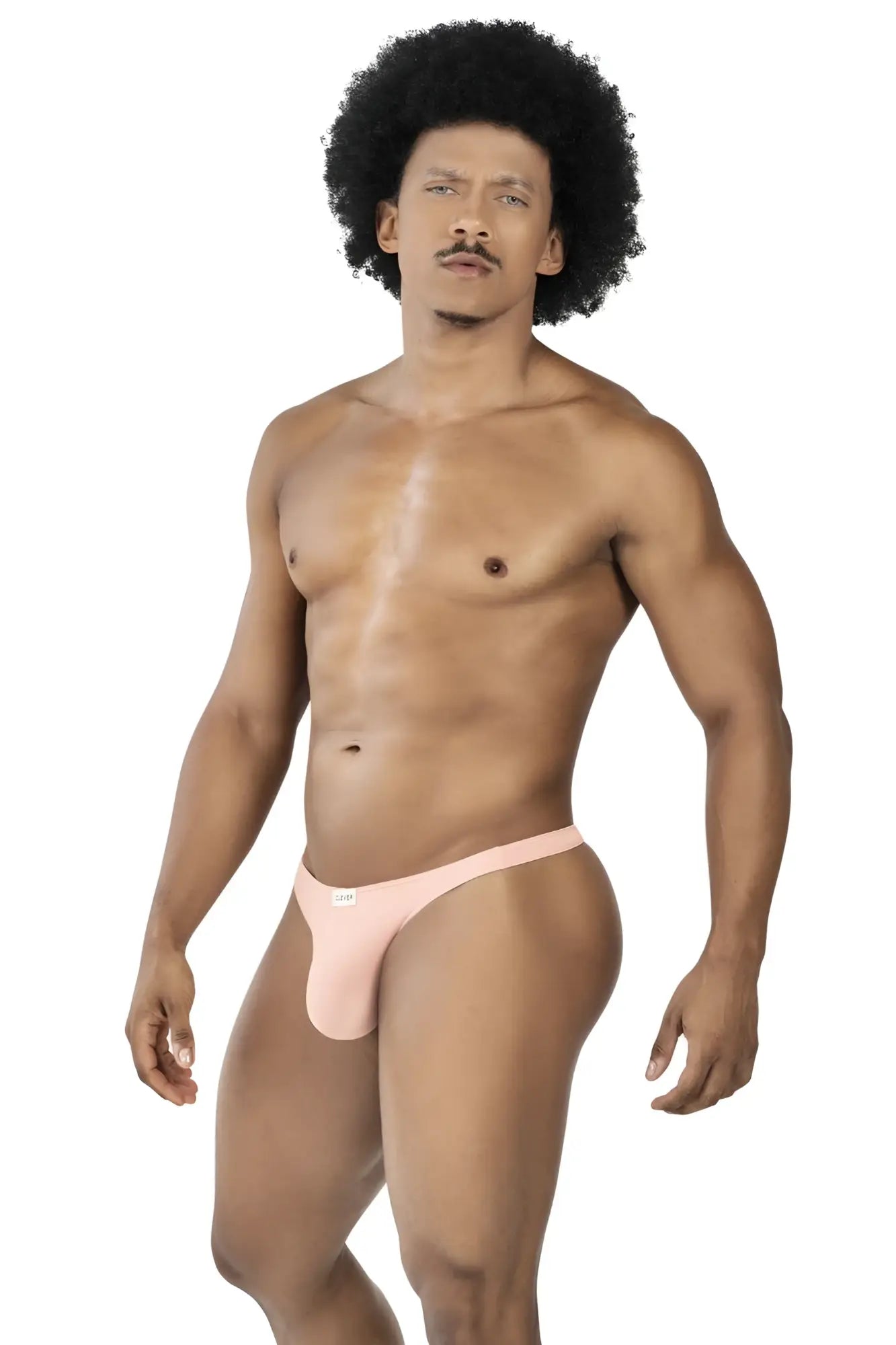 A light pink form-fitting thong made of smooth fabric from clever 100007 3pk australian latin thongs set