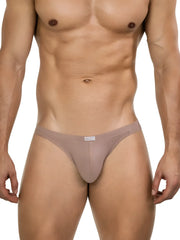 Beige ribbed cotton apolo bikini briefs with a small white brand tag at the waistband for sophisticated comfort and style