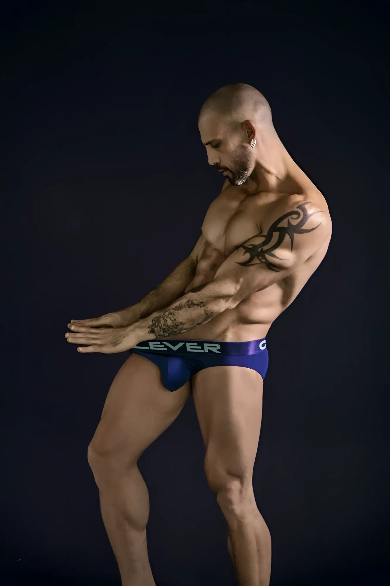 Blue clever athletic briefs with white logo on waistband part of a 3pk australian latin briefs set in beige blue and green