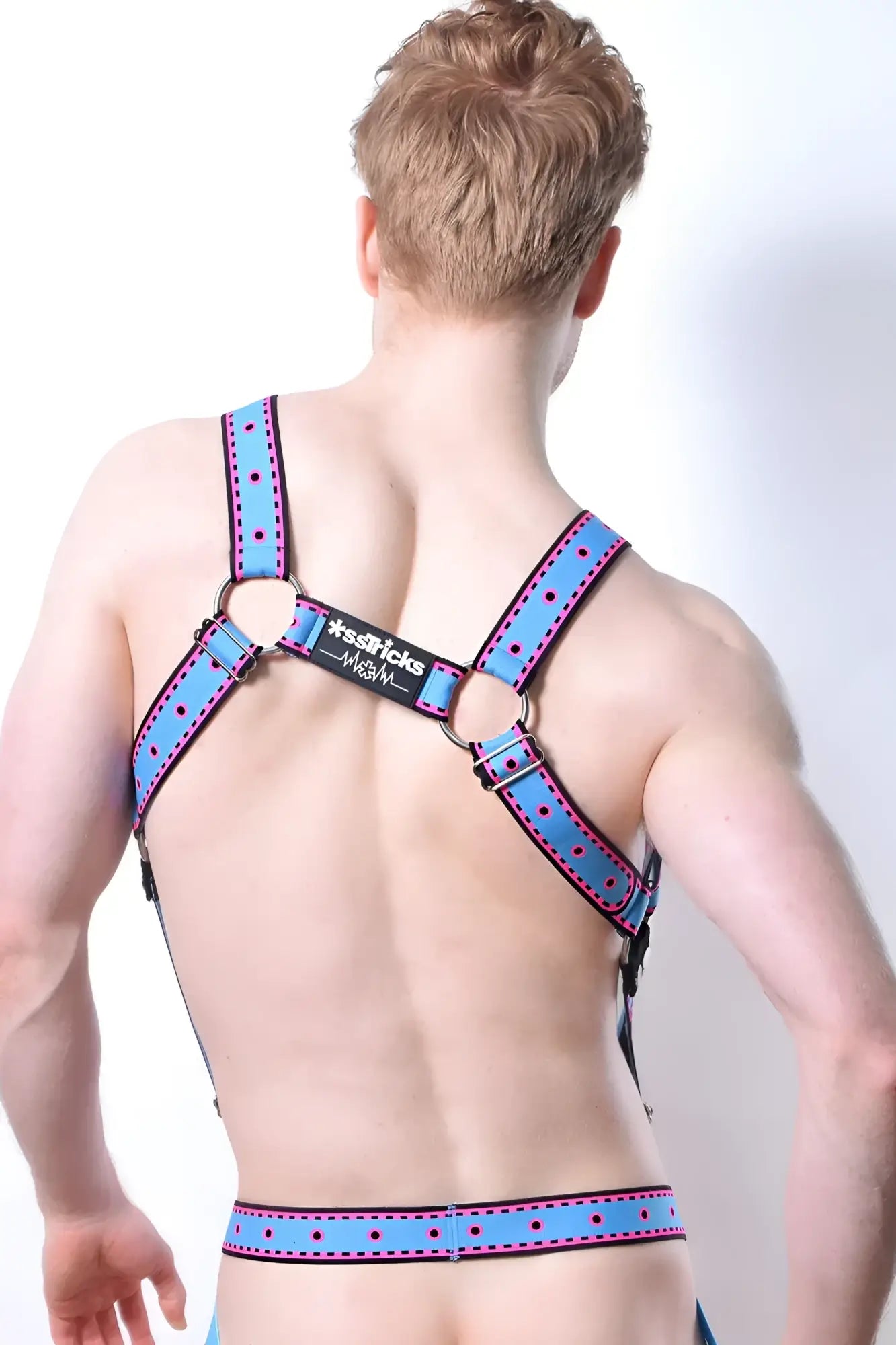 Comicaze harness blue polka-dotted leather harness with black metal rings and branded label front view