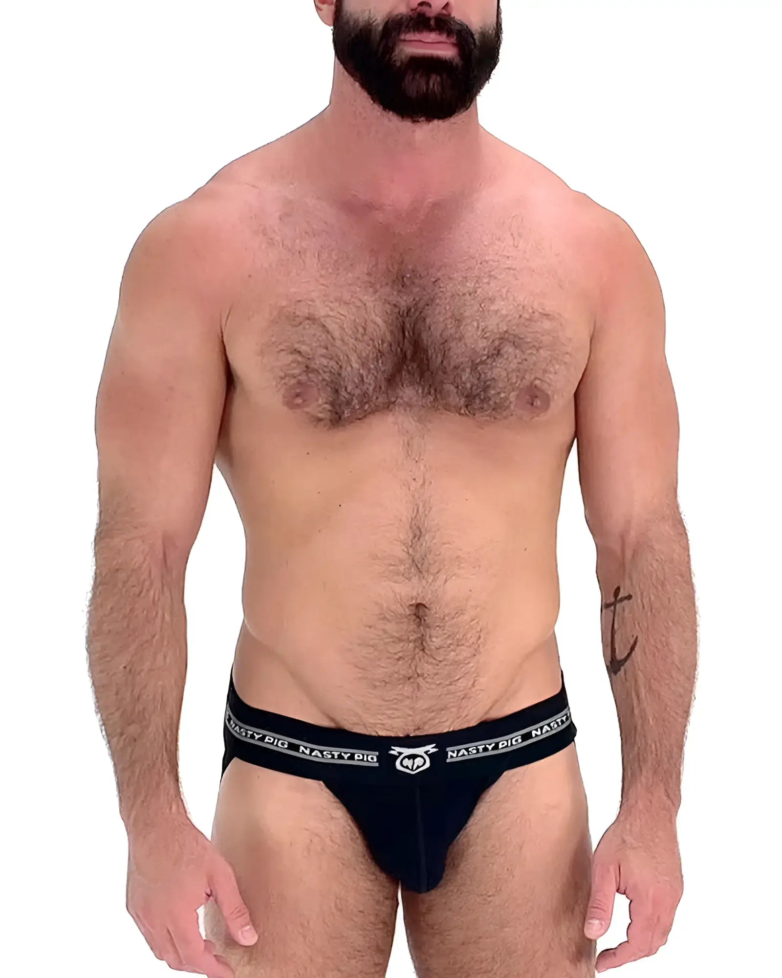 Black nasty pig brand core jockstrap briefs with white logo and text on the waistband