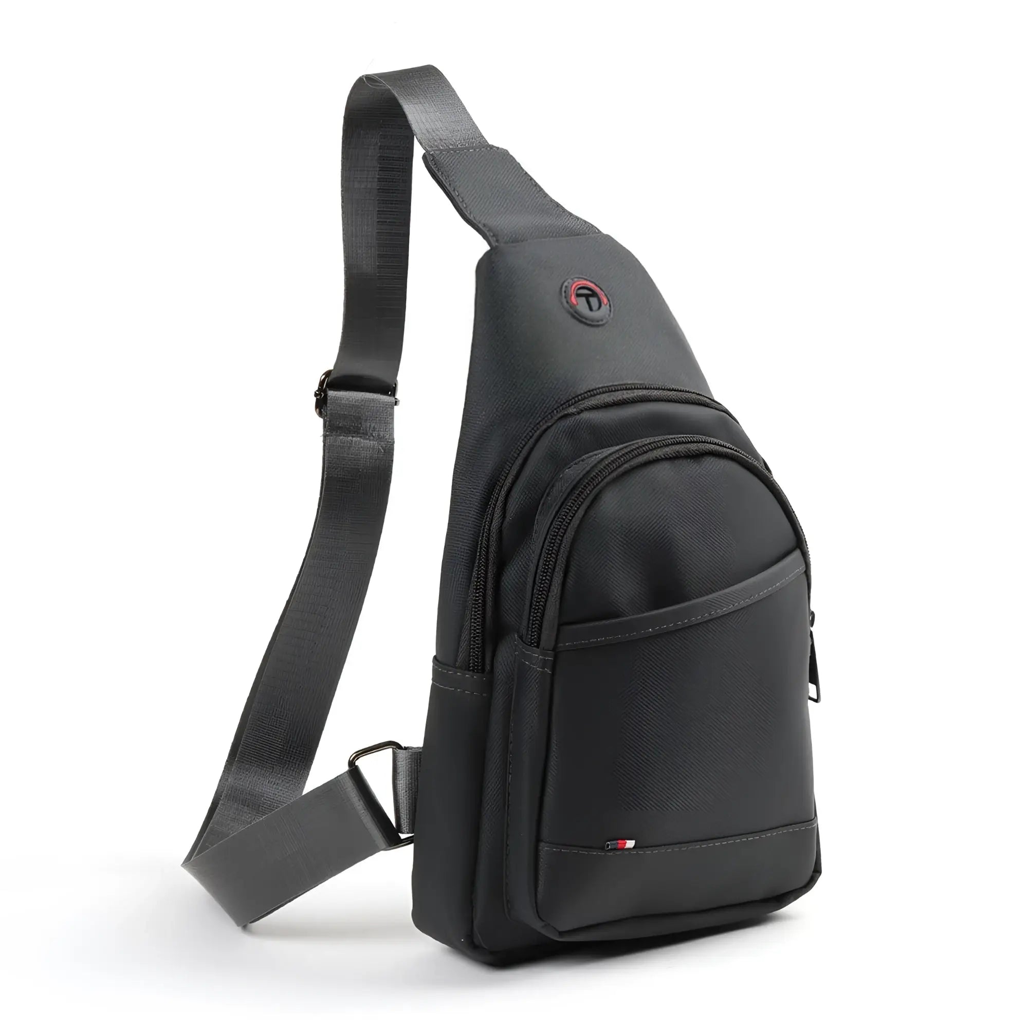 Black nylon crossbody sling bag with sleek minimalist design and subtle red logo accent for everyday use