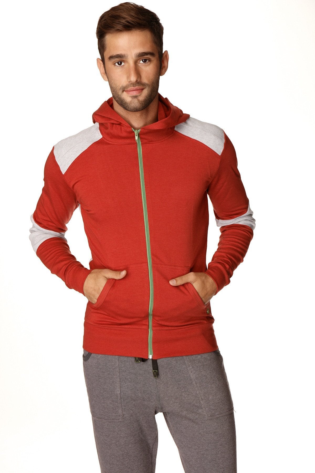Red and white color-blocked form-fit crossover yoga track hoodie with gold zipper in cinnabar grey for performance