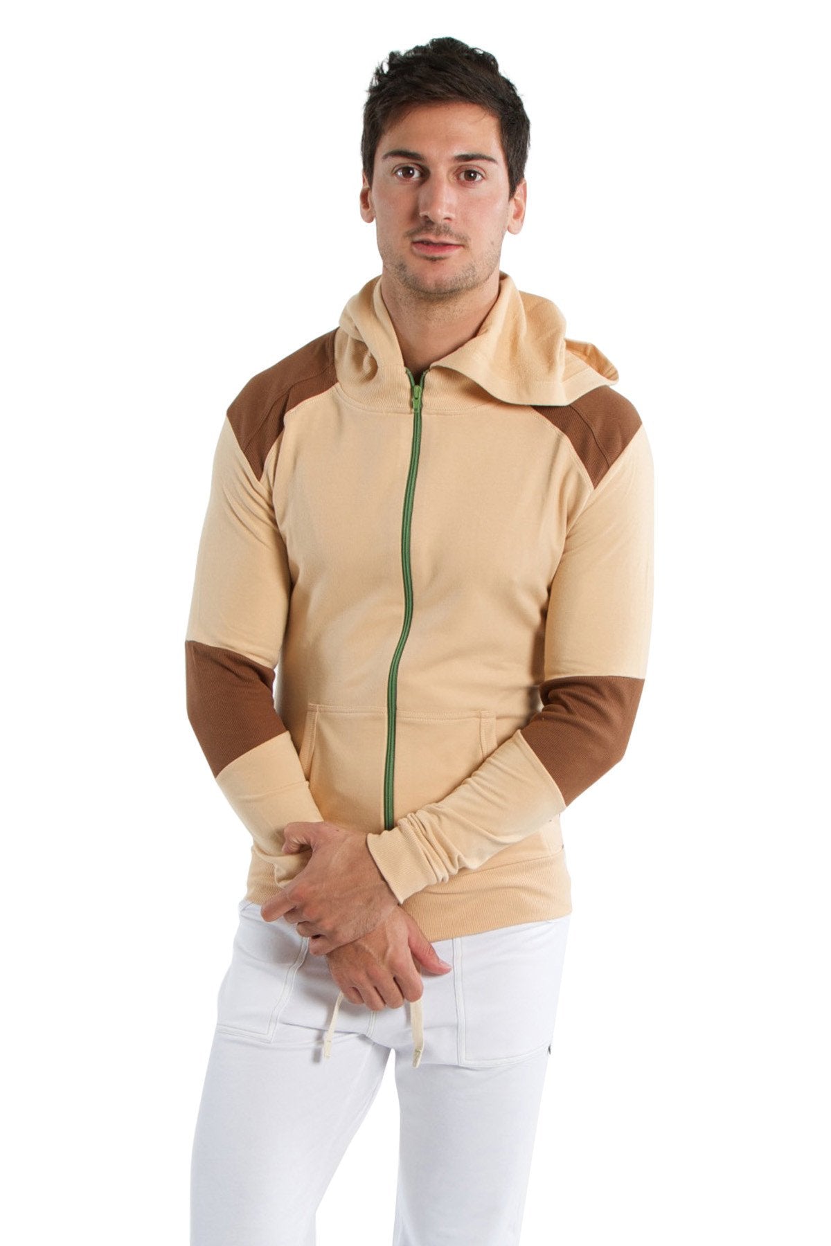 Form-fit crossover yoga track performance hoodie in sand with chocolate color block and green zipper for workouts