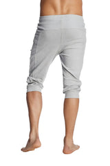 Gray heathered cuffed yoga pants with rolled cuffs and side pockets in jogger-style capri length