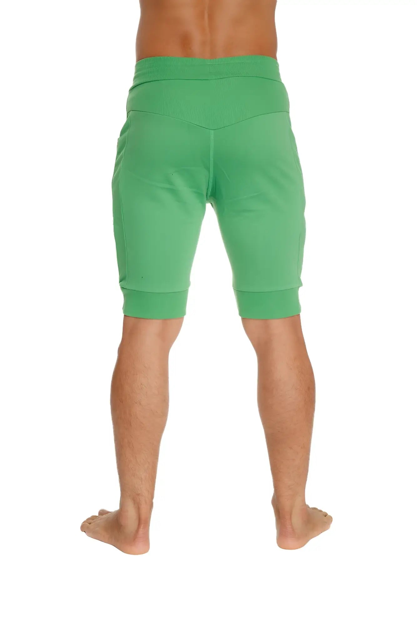 Cuffed yoga short in bamboo green featuring elastic waistband ribbed cuffs made from breathable fabric