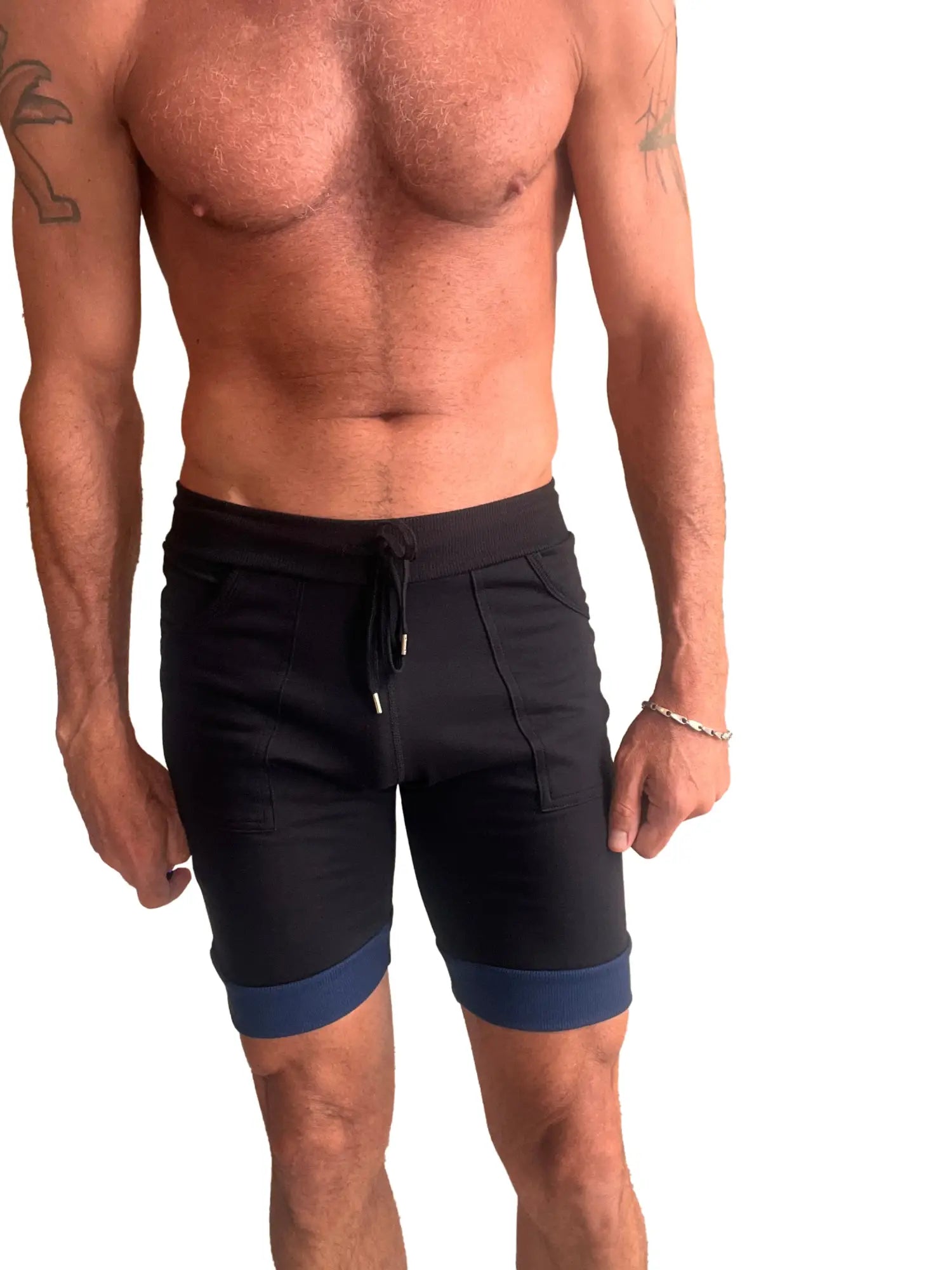 Cuffed yoga shorts in black with grey and royal navy blue contrast trim at cuffs and a drawstring waistband