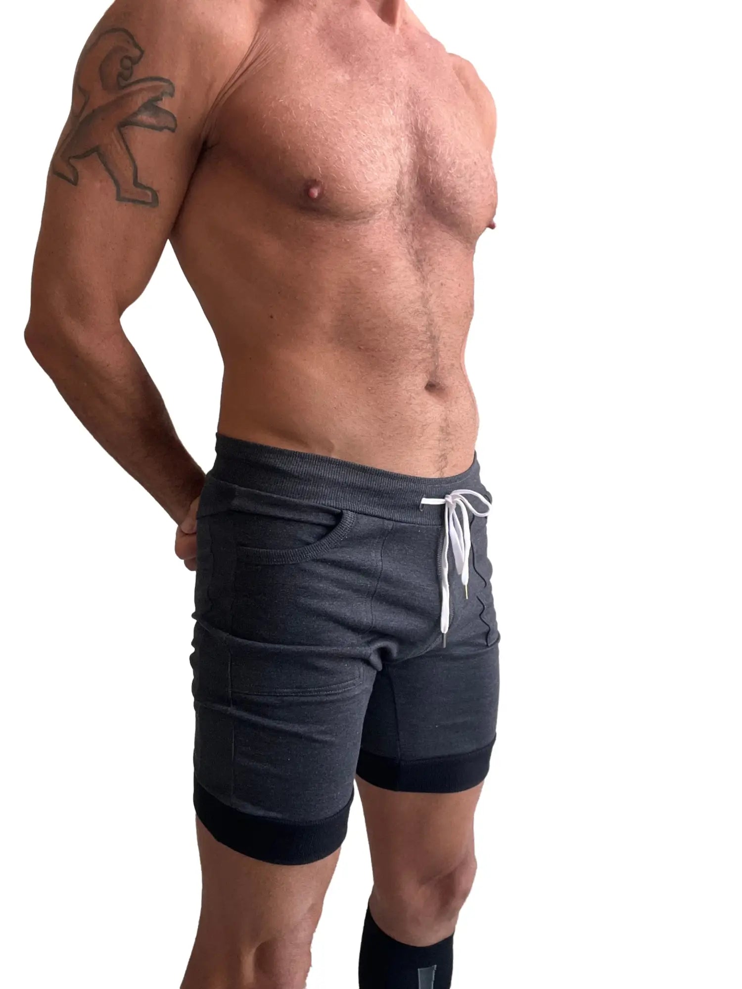 Dark gray cuffed yoga shorts with black trim and white drawstring designed for athletic and casual wear