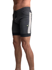 Dark gray cuffed yoga shorts with white stripe black trim side pockets and adjustable drawstring waistband