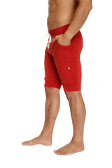 Red cuffed yoga shorts with white drawstring and side pockets designed for athletic and casual wear