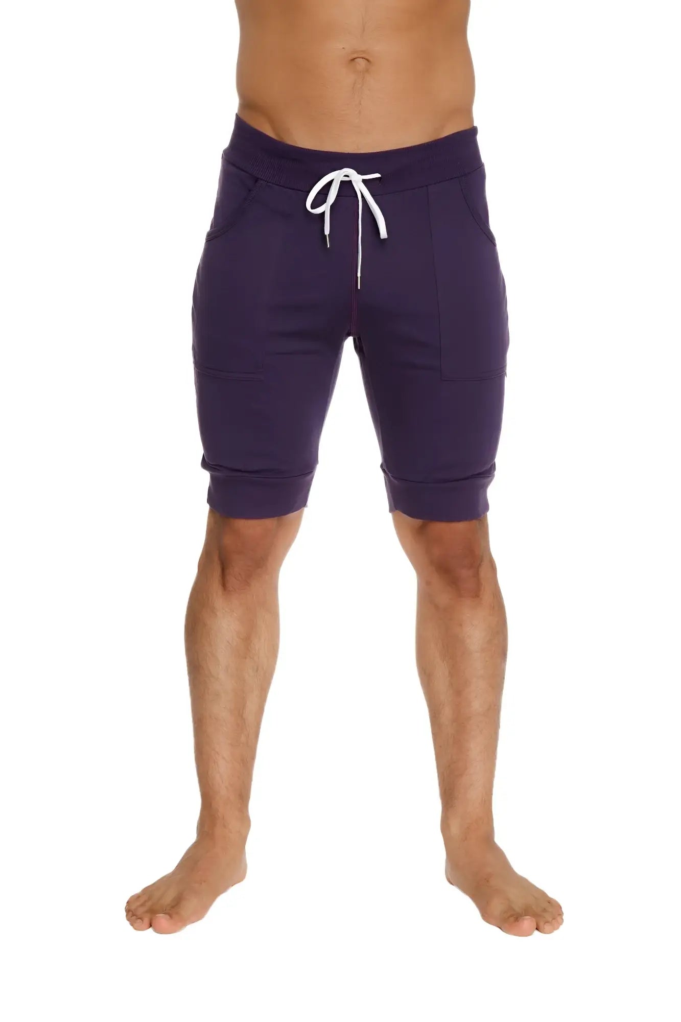 Purple cuffed yoga shorts with white drawstring and side pockets designed for athletic wear