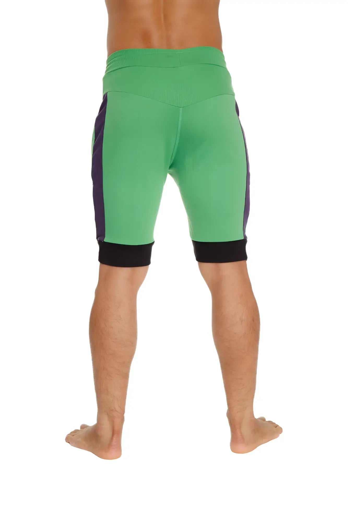 Cuffed yoga short in green with purple side panels and black trim featuring comfortable athletic fabric