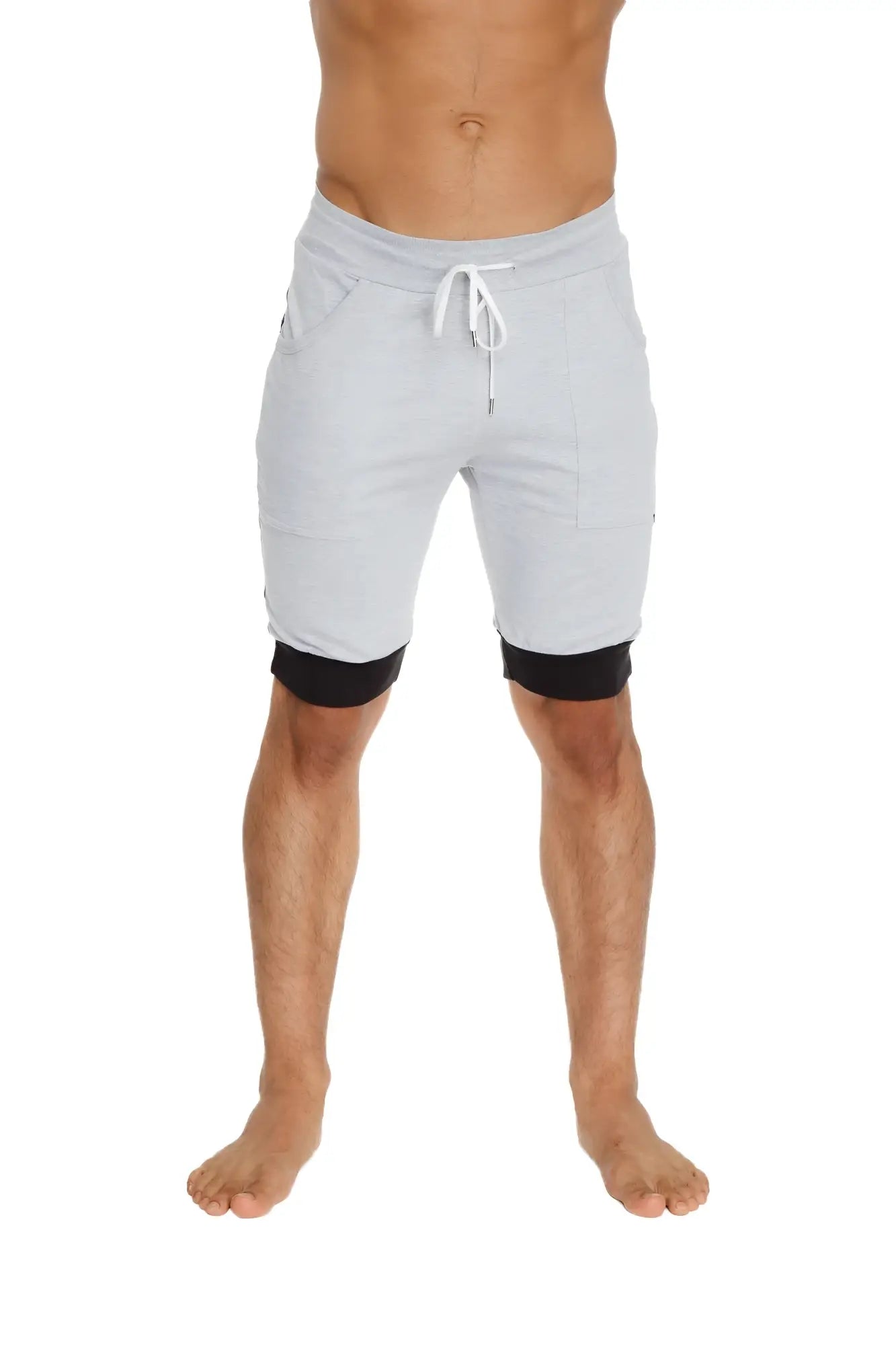 Light gray and black cuffed yoga short with drawstring waistband and two-in-one design for comfortable workouts