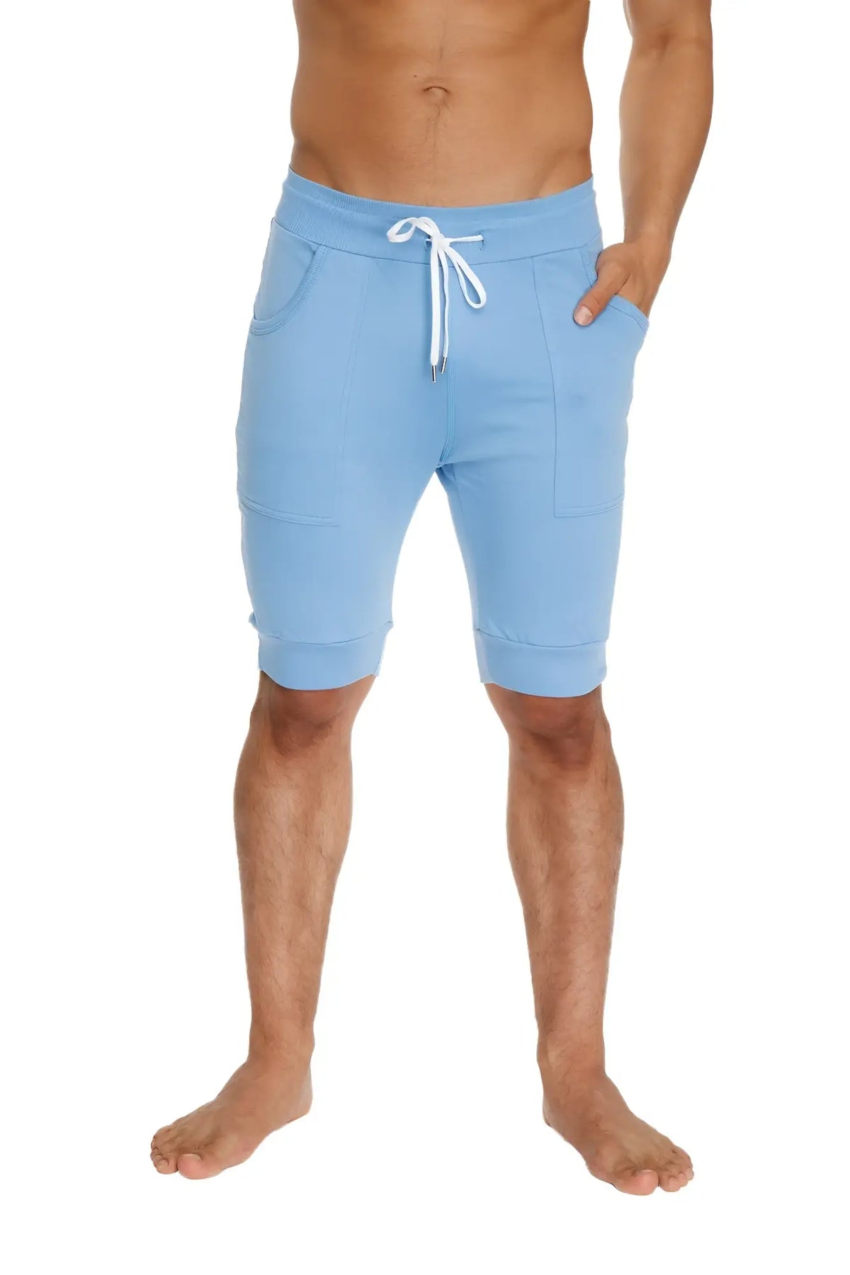 Light blue cuffed yoga shorts with white drawstring and side pockets made for athletic and casual wear