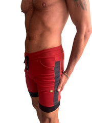 Red cuffed yoga shorts with ribbed waistband and black charcoal side panels for athletic wear