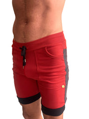 Red cuffed yoga shorts with ribbed waistband black drawstring and gray side panels for athletic wear